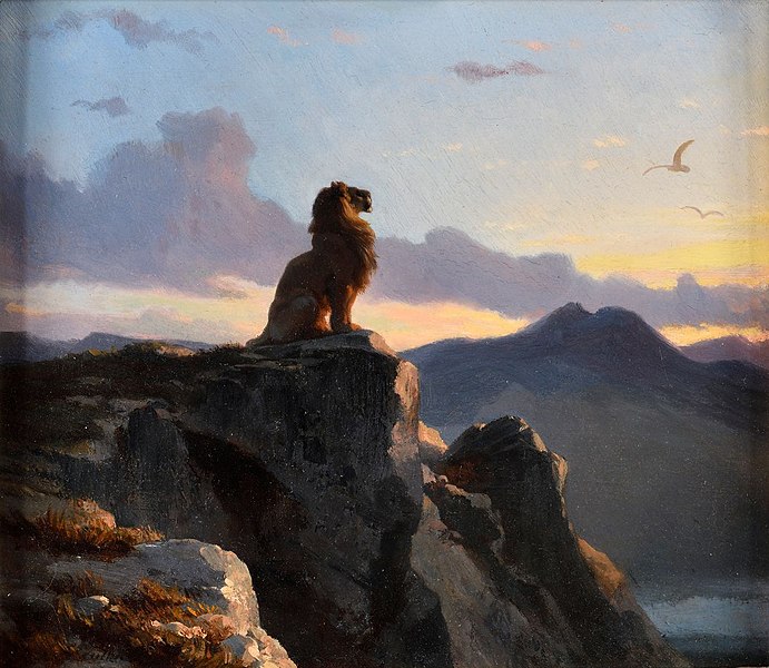 https://commons.wikimedia.org/wiki/File:A_lion_sitting_on_the_edge_of_a_cliff.jpg